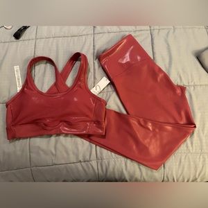 2 piece Metallic Pink. Sports set. Top size L. Bottoms XL.